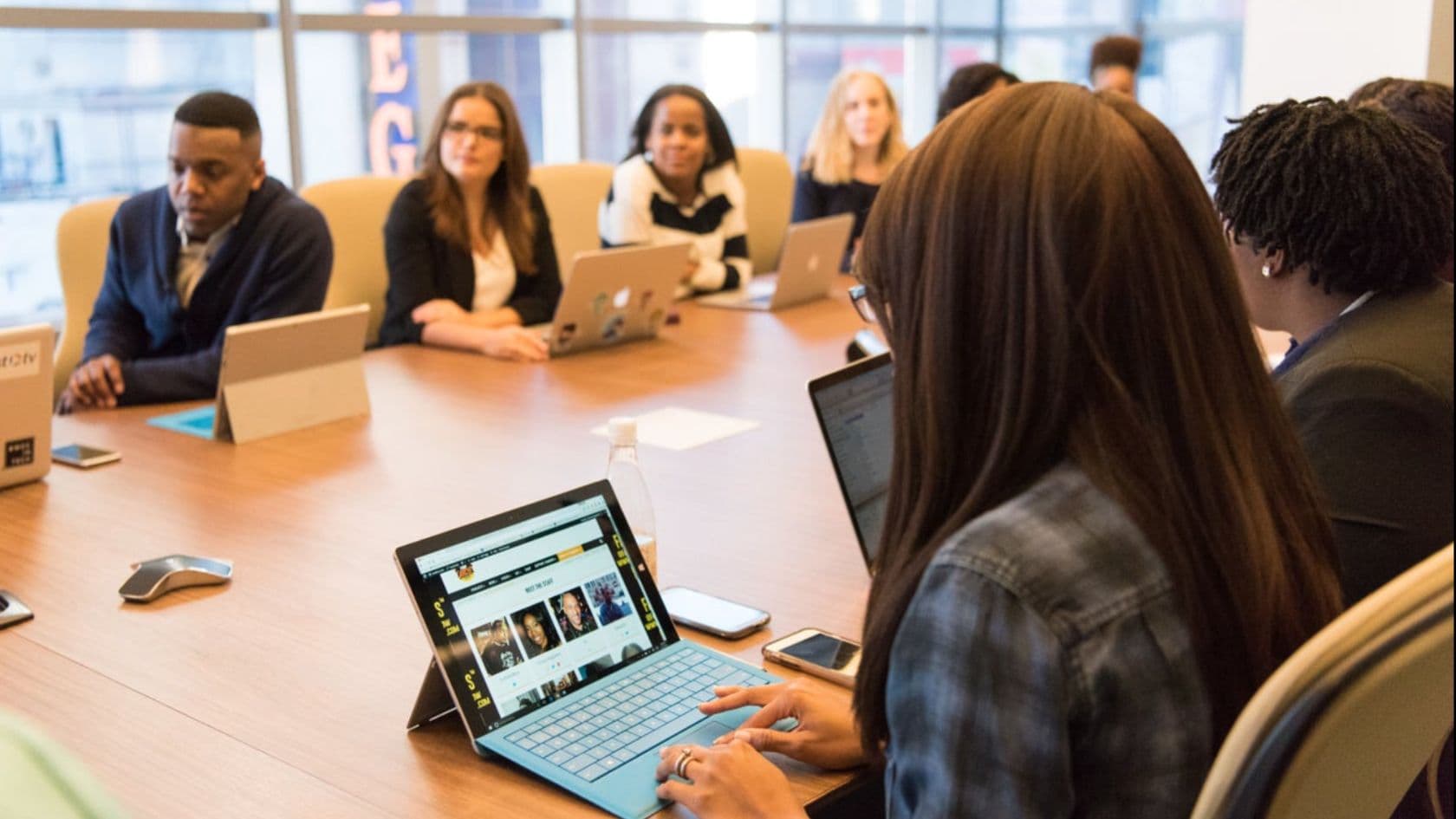 Community partners meeting together around a shared workspace in Southern Nevada.