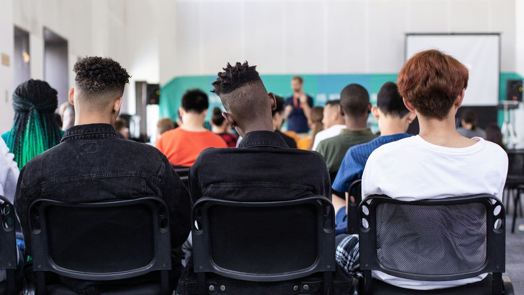 Young people in conversation at a community center in Southern Nevada.