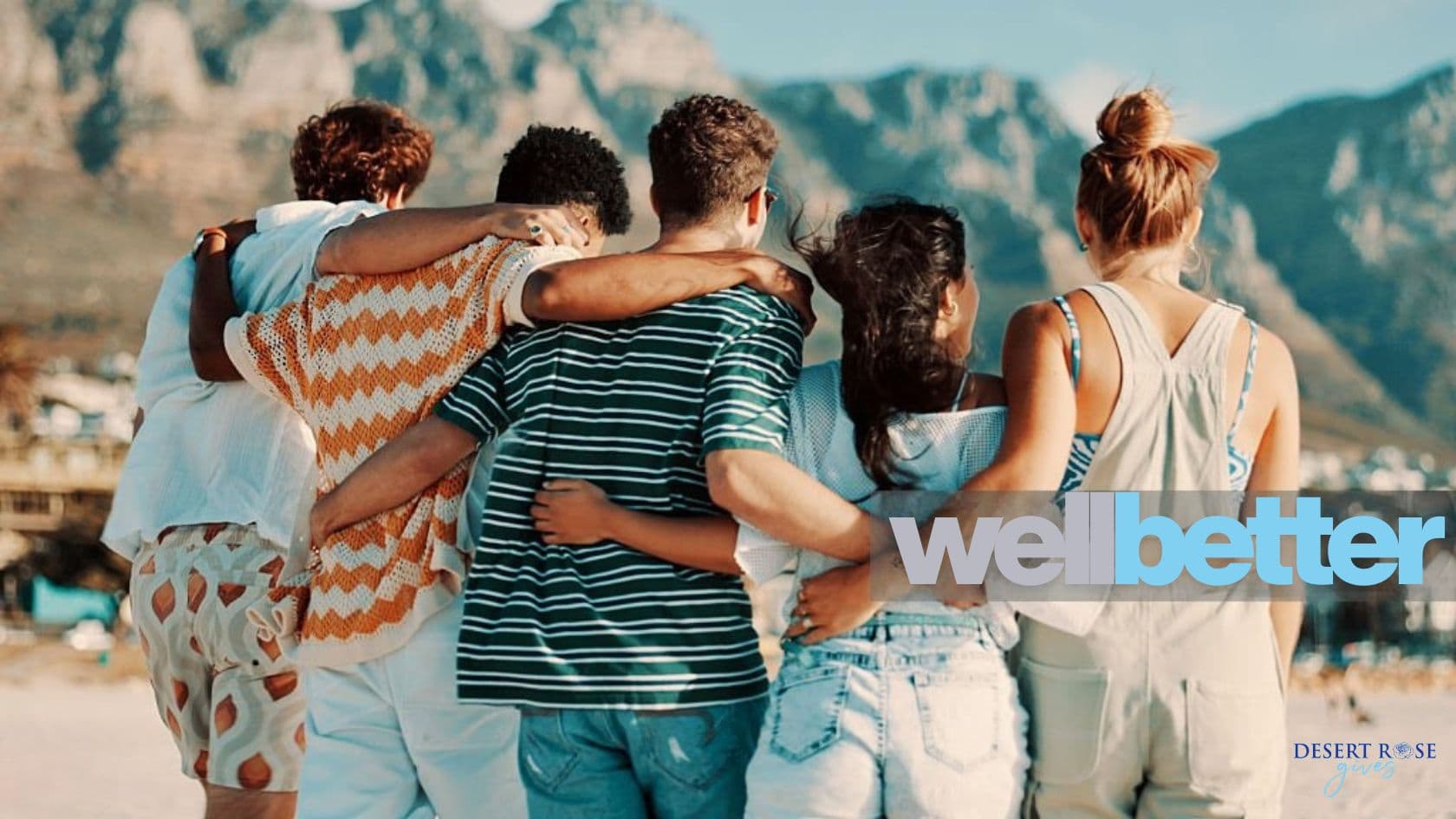 Community members of different ages gathered together outdoors in Southern Nevada during a Desert Rose Gives event.