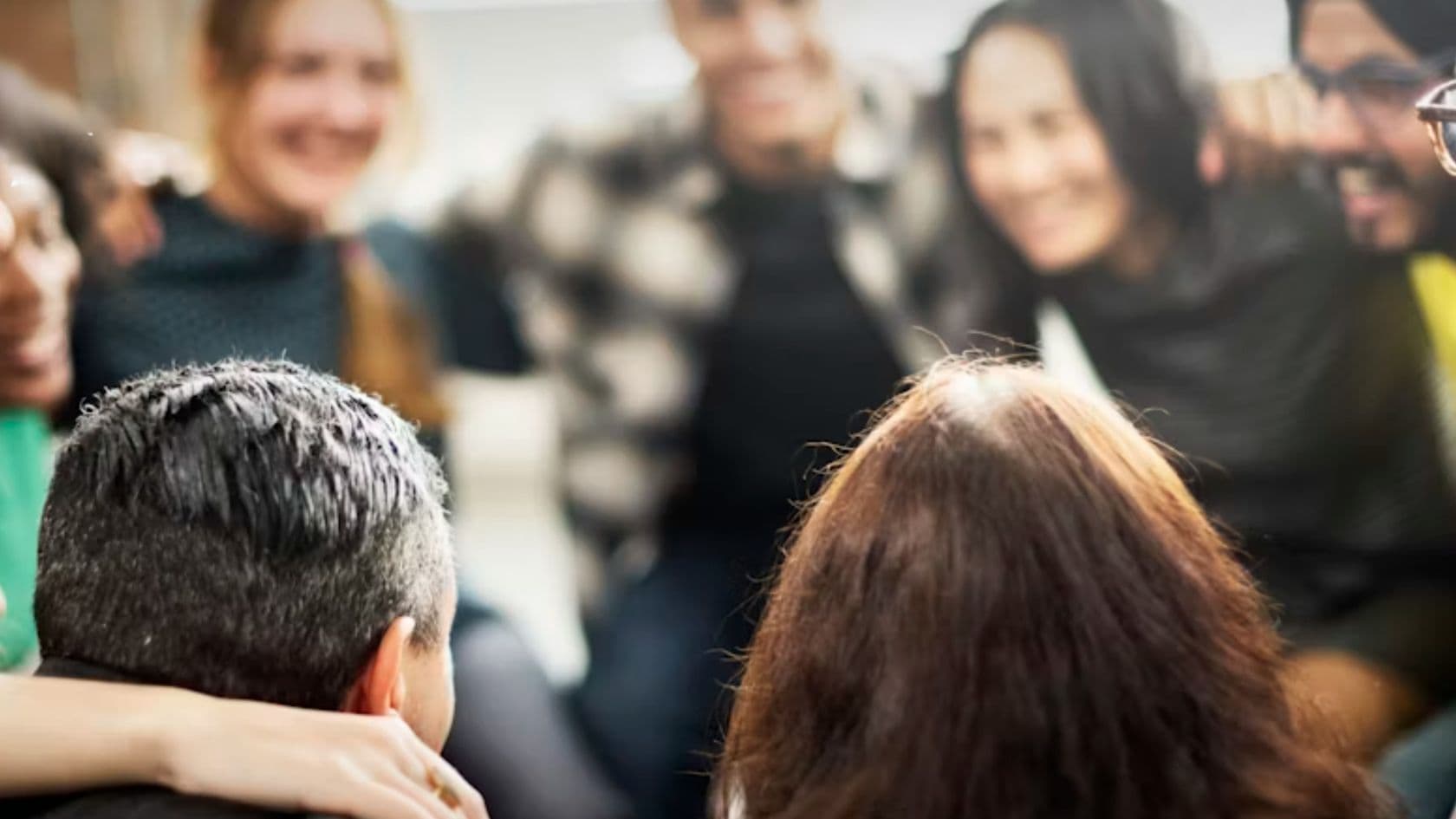 Community members gathered together in a Desert Rose Gives program space.